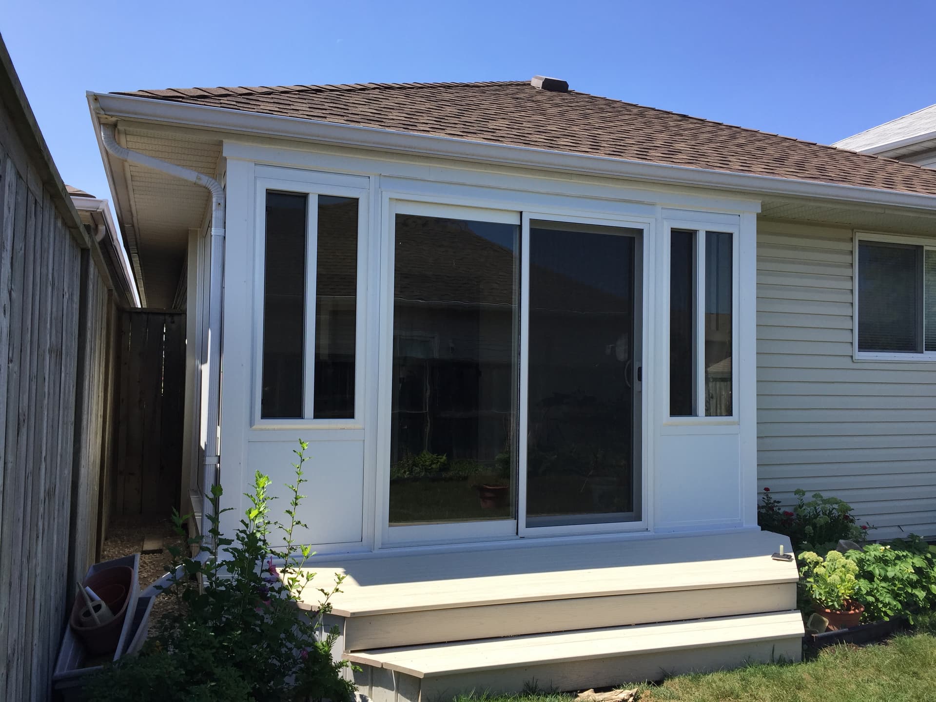 3 1/2 season sunroom enclosure in Sarnia with cozy interior