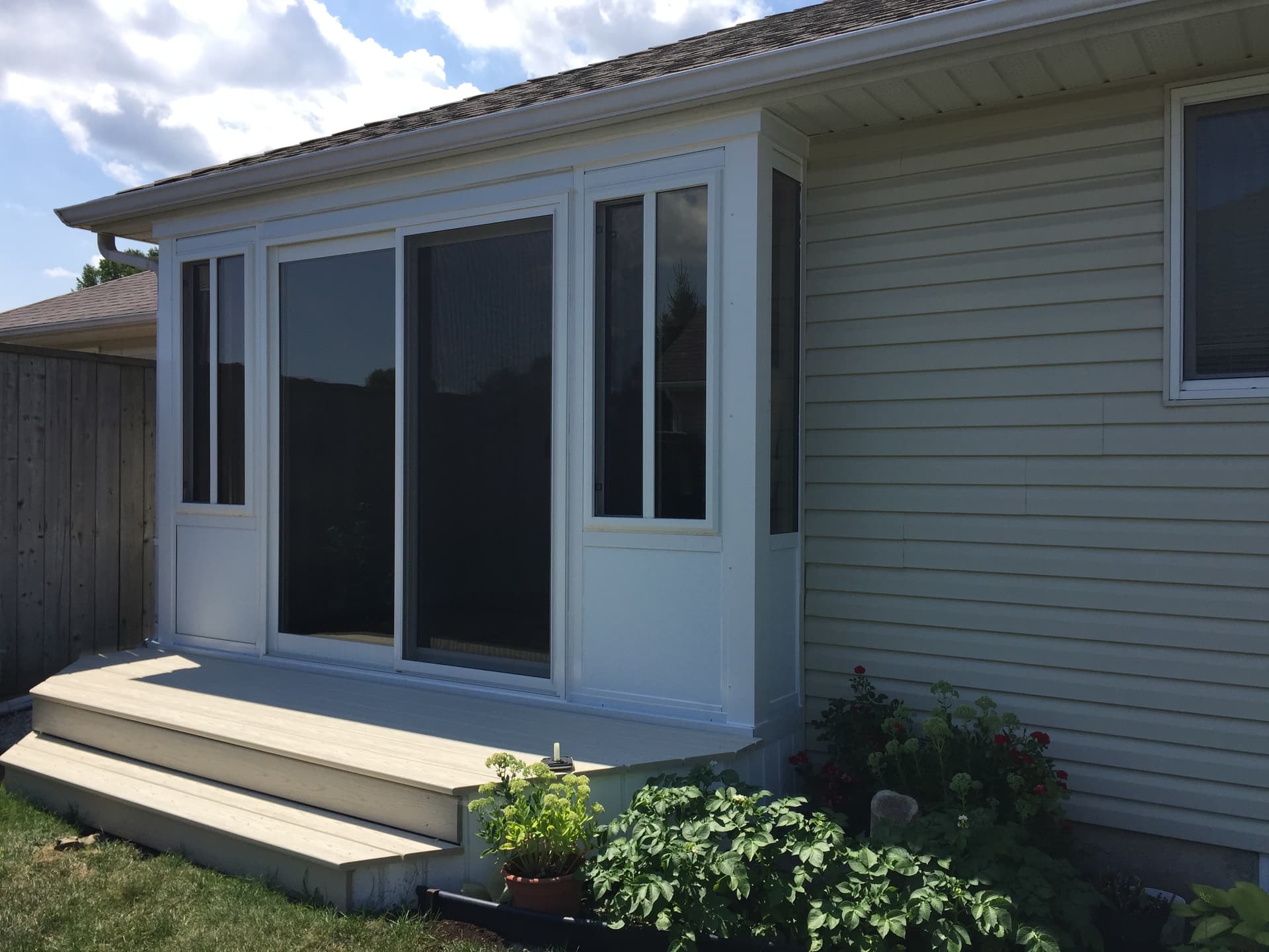 3 1/2 season sunroom enclosure with optional heating in Lambton County