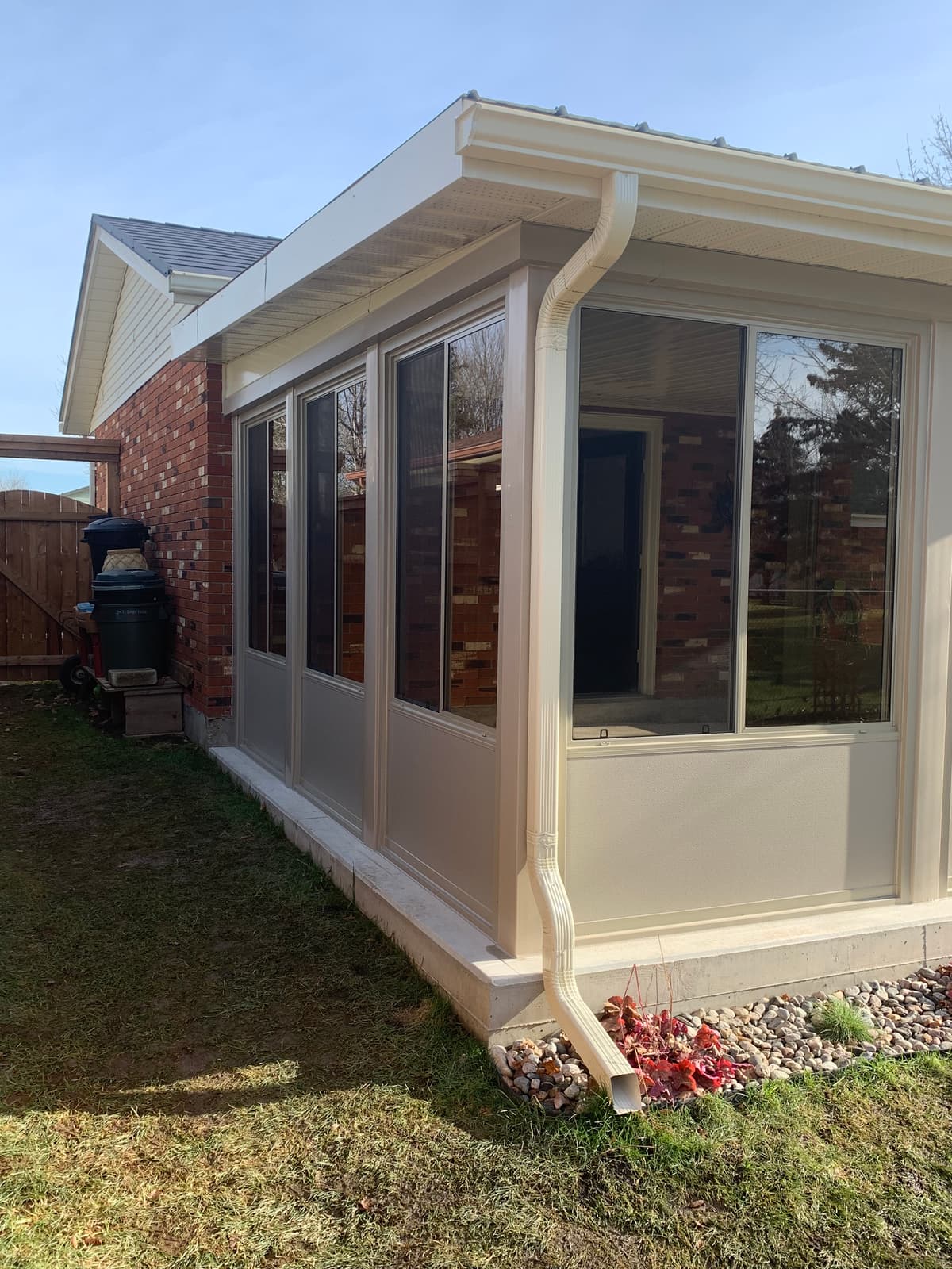 Custom 3 season sunroom enclosure with bug-free screened walls in Sarnia