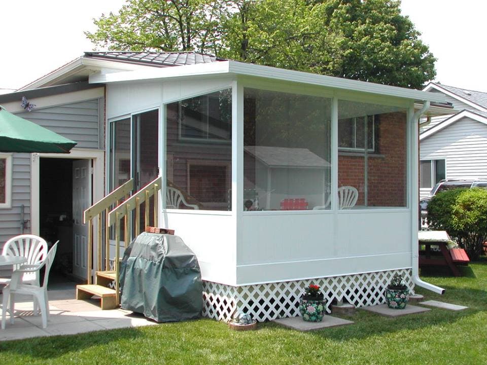 Modern 3 season sunroom extension for covered porch in Sarnia