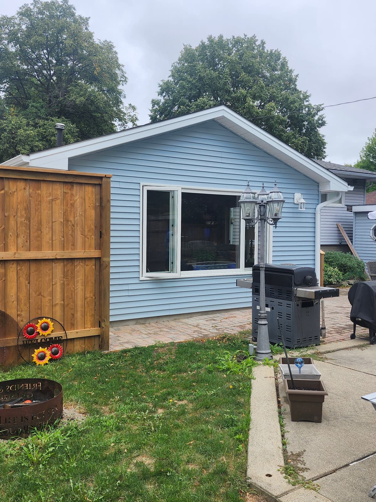 Family gathering in custom sunroom addition in Sarnia Ontario