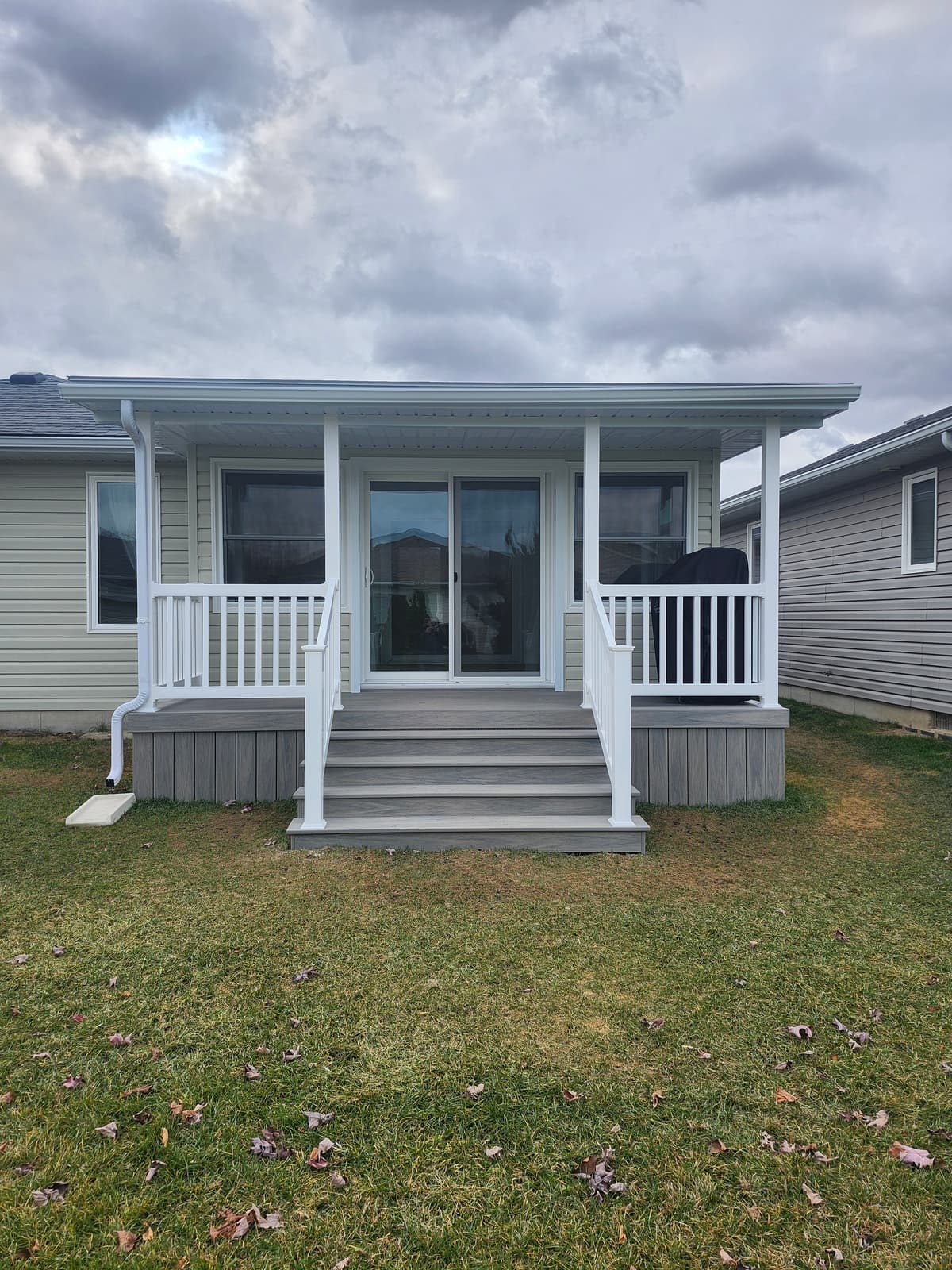 Spacious sunroom addition family room in Lambton County home