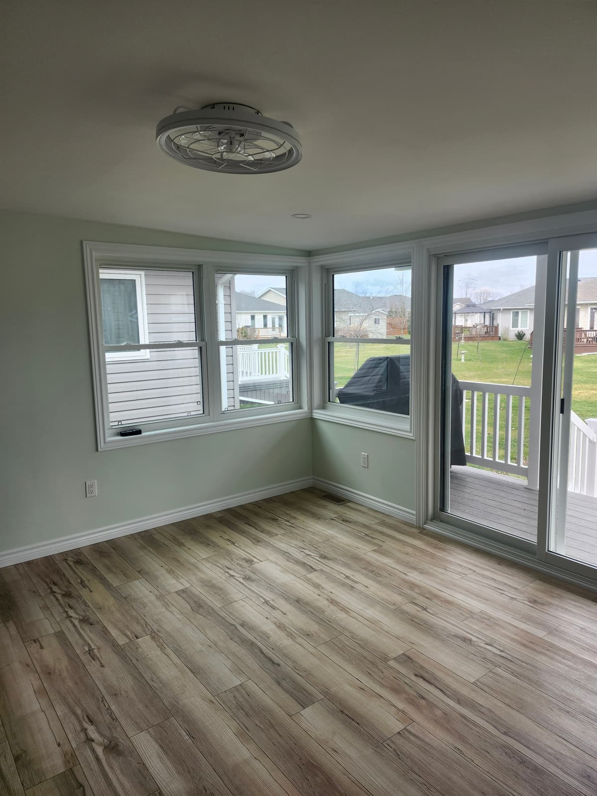 Cozy sunroom addition reading nook in Lambton County home