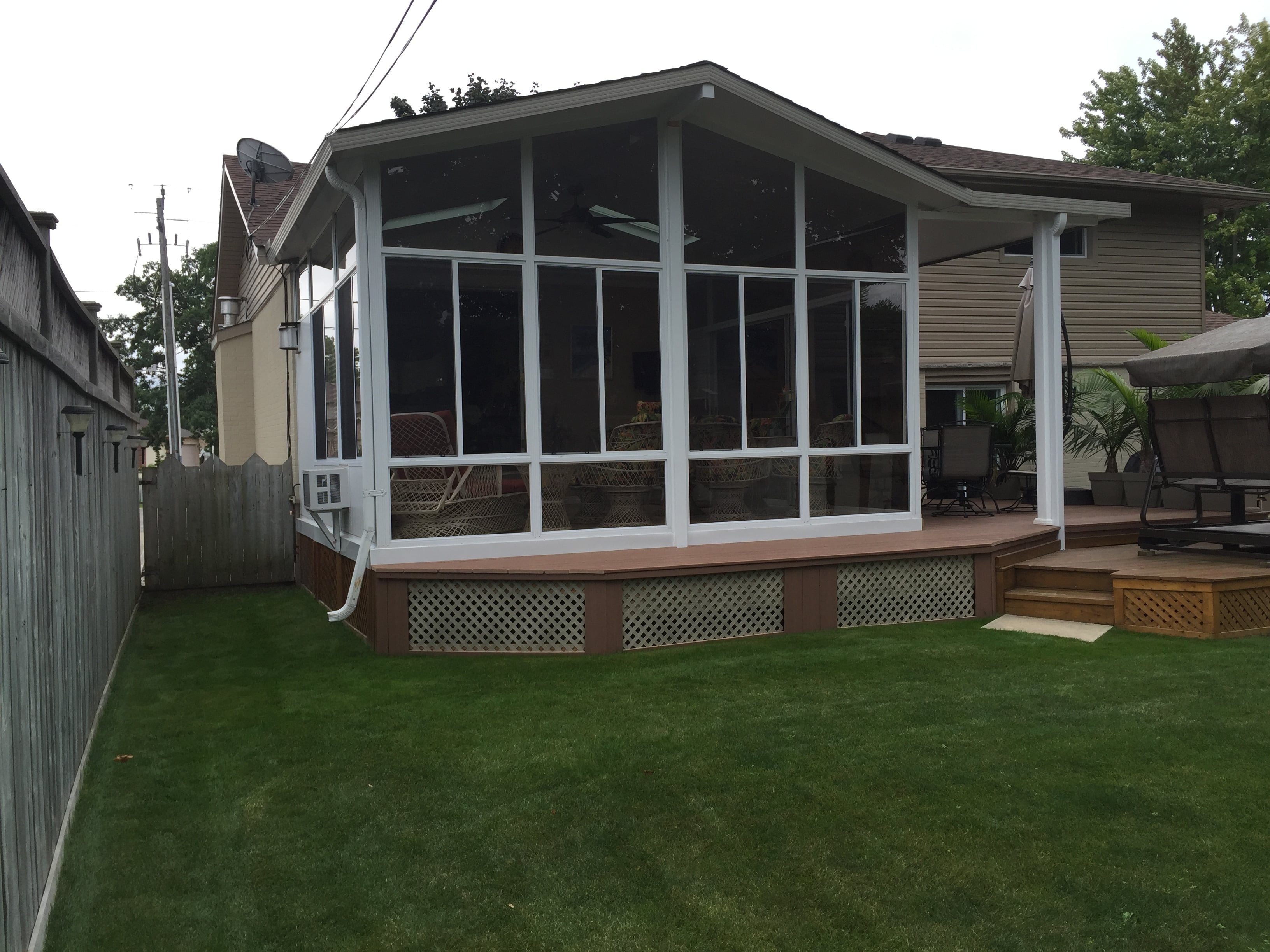 Bright 3 season sunroom extension – view 1