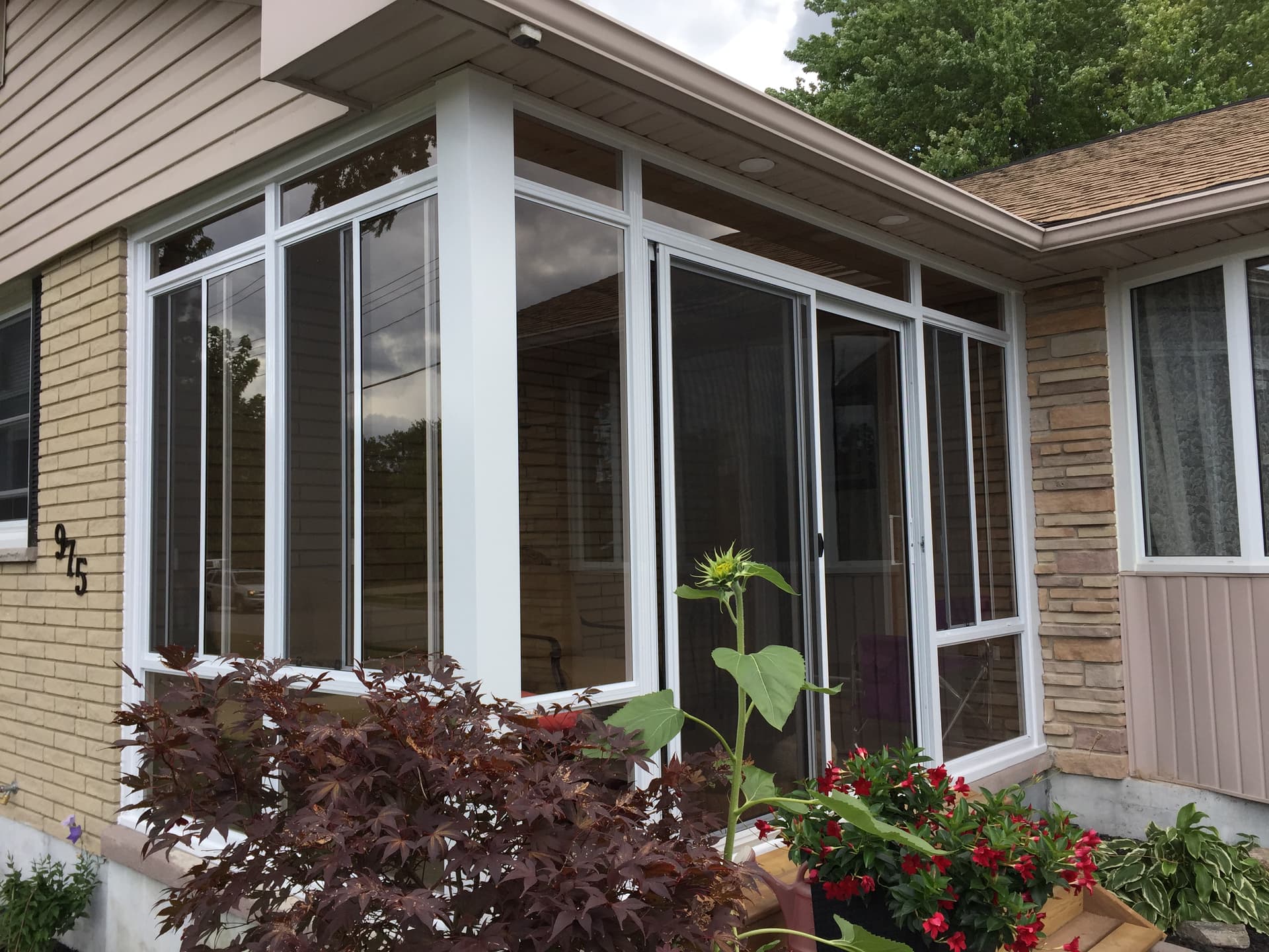 Front porch sunroom enclosure in Lambton County
